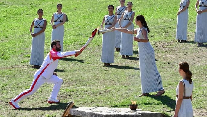 Greece saw the Beijing Winter Olympic flame being lit amid protests by activists