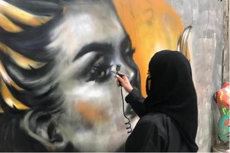 Jordan – Saudi young woman painting happiness on the walls of Riyadh – Photos